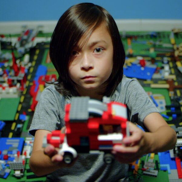 A little boy shows us his LEGO truck