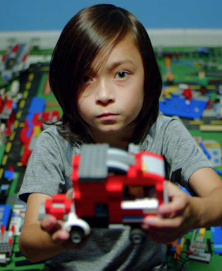 A little boy shows us his LEGO truck