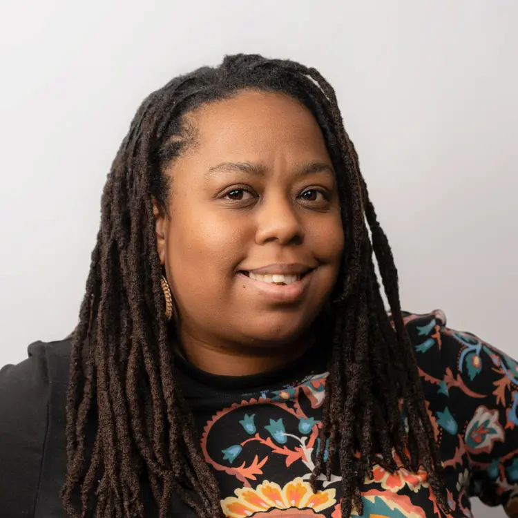 Photo of Krystal Dillard smiling at the camera.