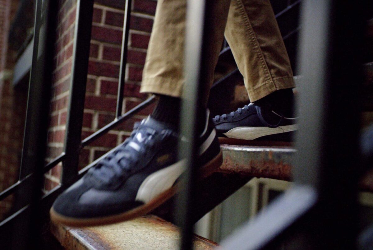 Closeup photo of Puma shoes going down stairs
